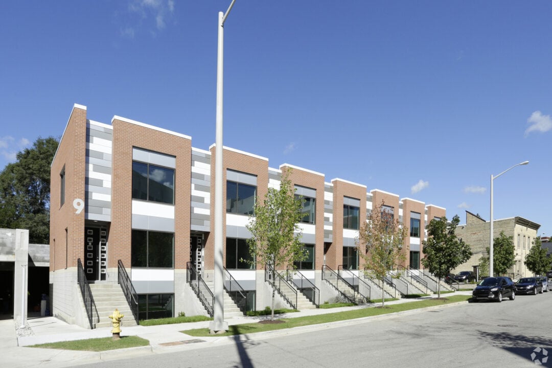 Modern brick row houses with blue sky